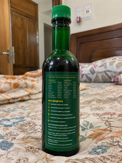 Cuehealth EverYoung syrup bottle shared by Meera Kapoor