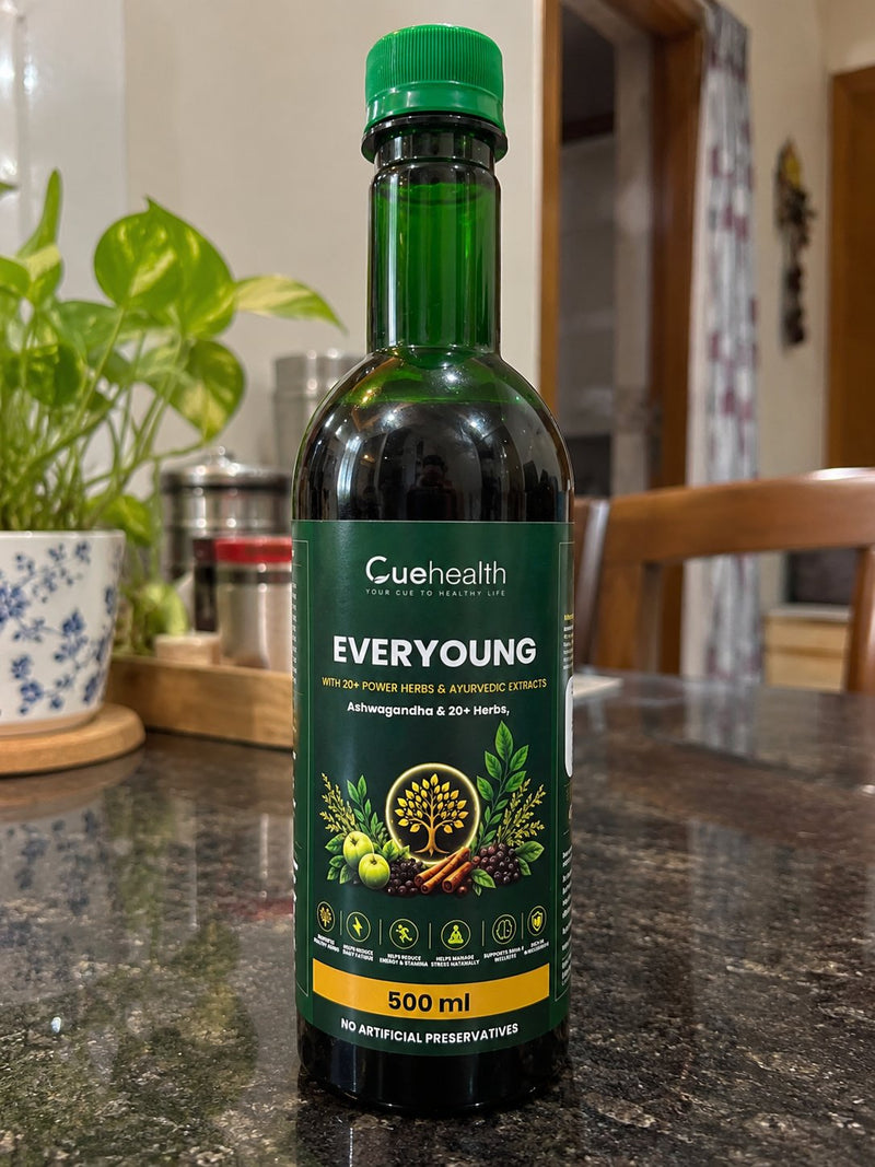 Cuehealth EverYoung syrup bottle shared by Radhika Sharma